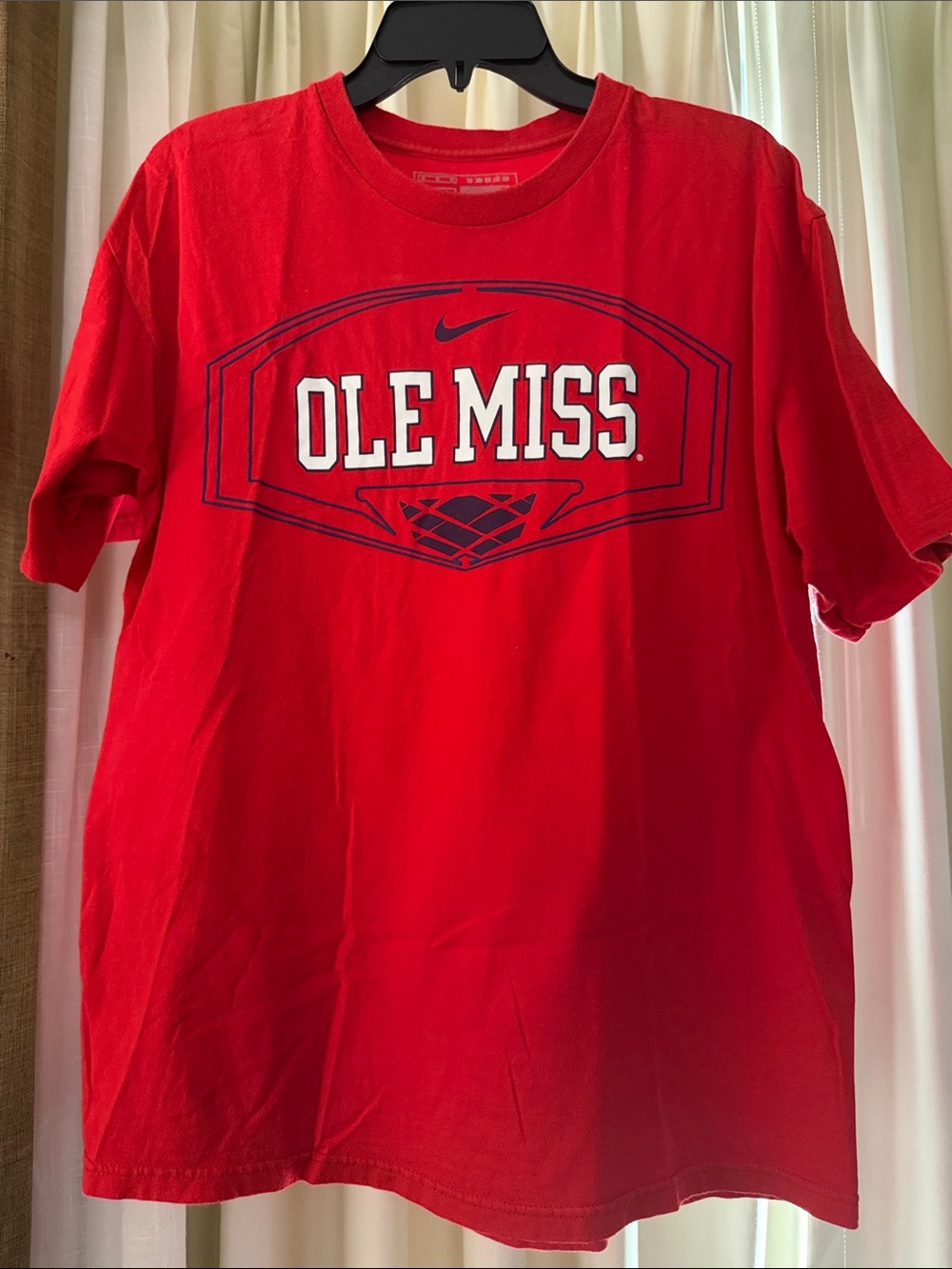Nike Ole Miss Red Short Sleeve Tee with Basketball Graphic